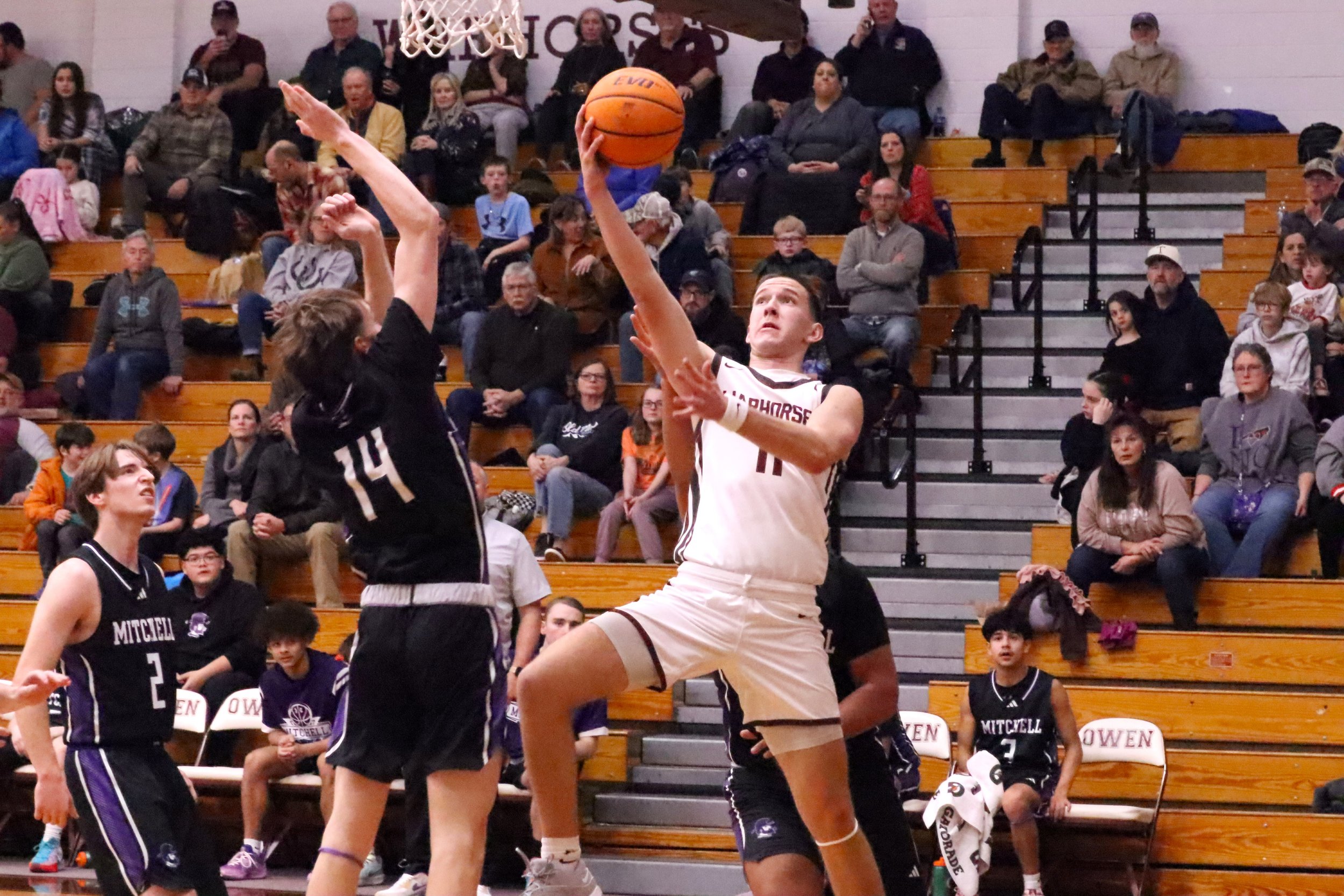 Warhorses top Mountaineers in Western Highlands Conference clash