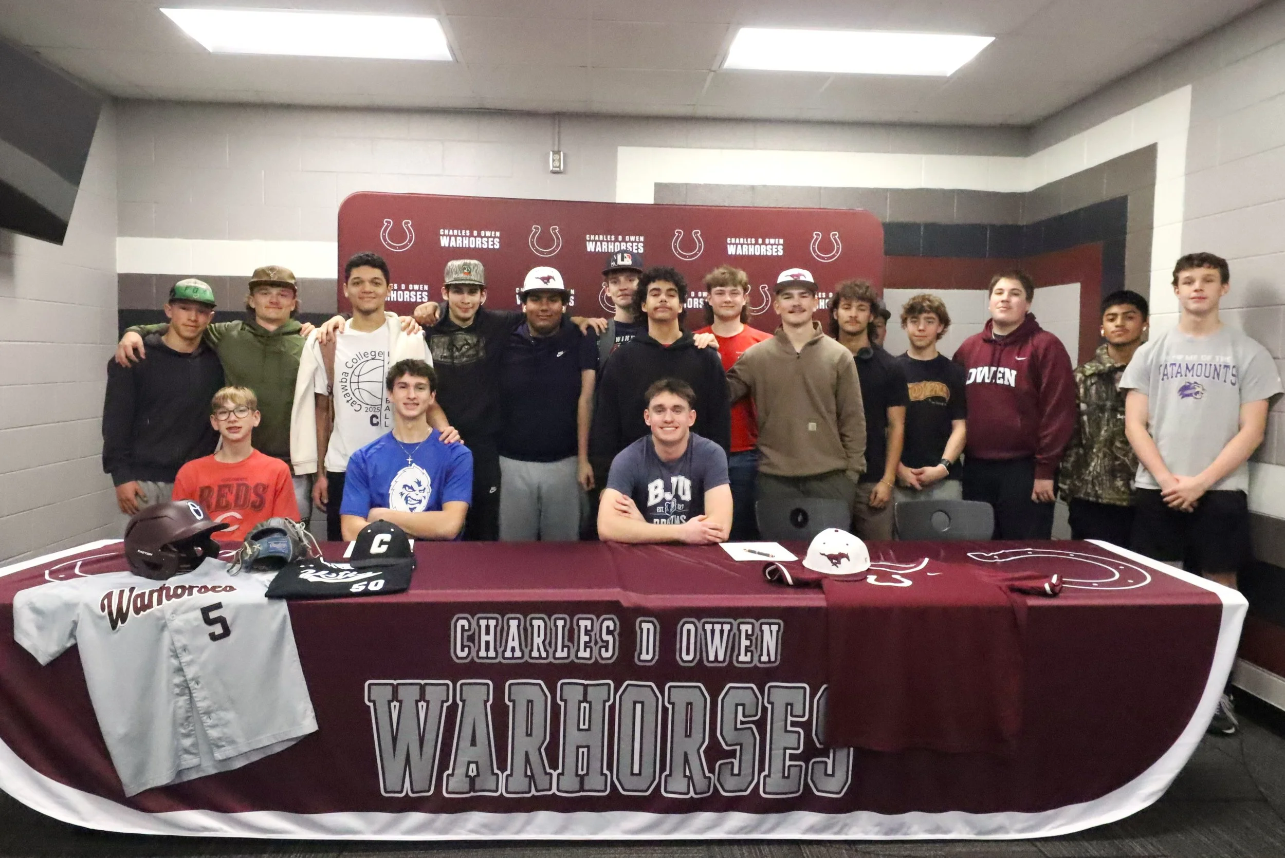 Owen baseball turns double play with signing ceremony