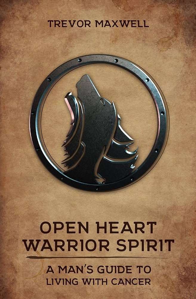 Book cover featuring a wolf silhouette in a circular frame. The title is "Open Heart Warrior Spirit" by Trevor Maxwell, and the subtitle reads "A man's guide to living with cancer."