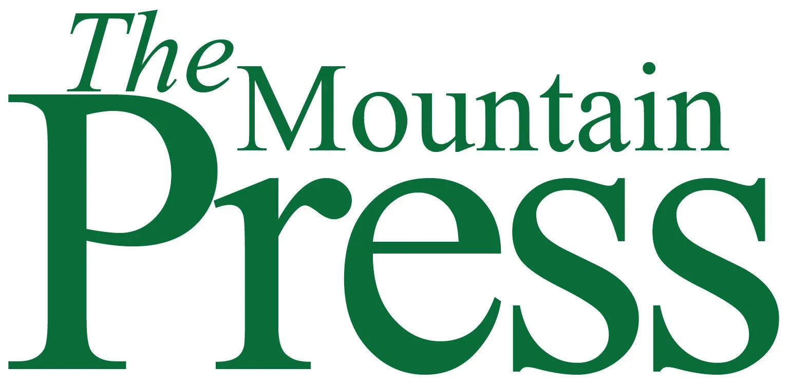 The Mountain Press logo.