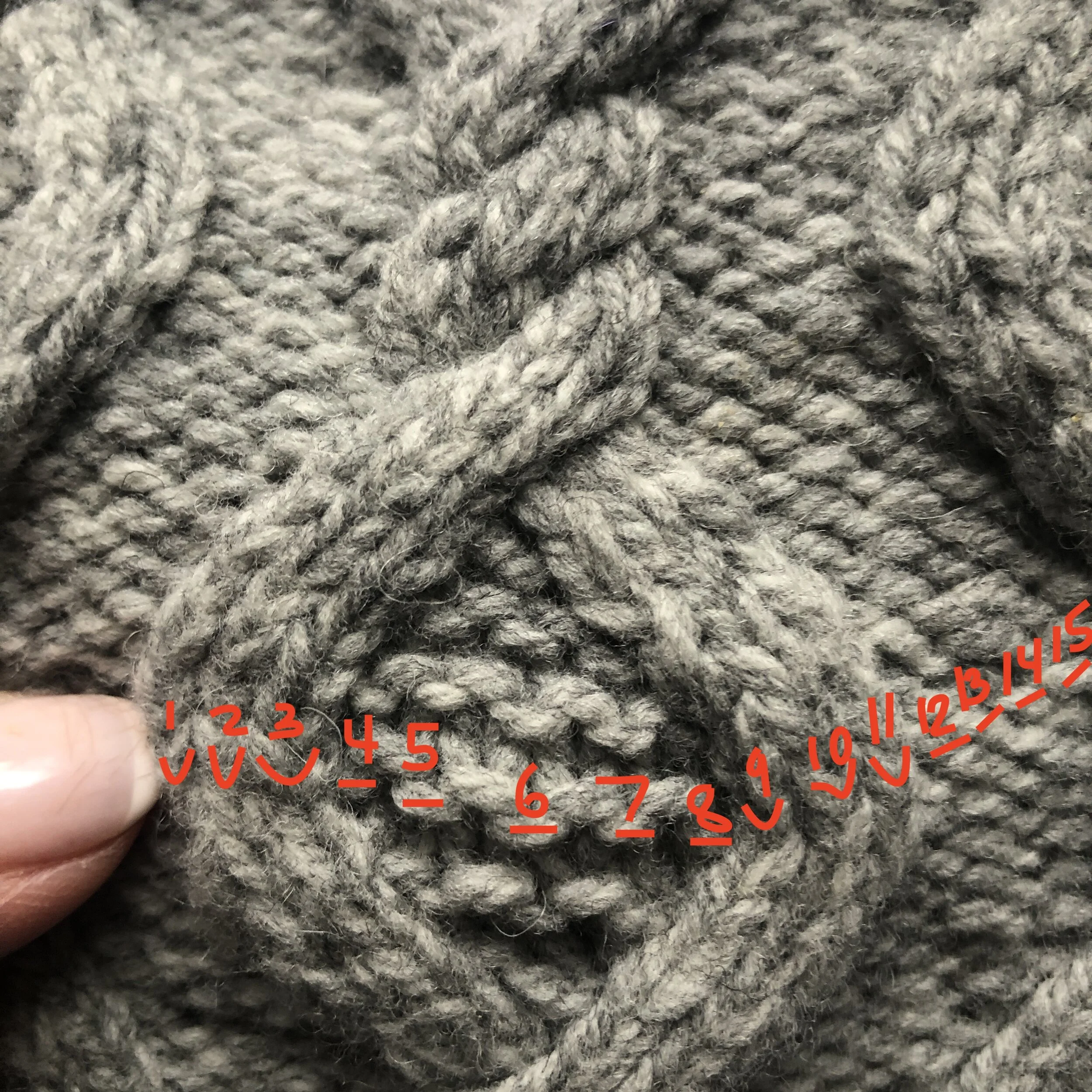 An example of counting stitches in a piece with cables. This swatch has Stockinette AND garter (knit every row), along with reverse Stockinette (purl on the right side, knit on the wrong side).