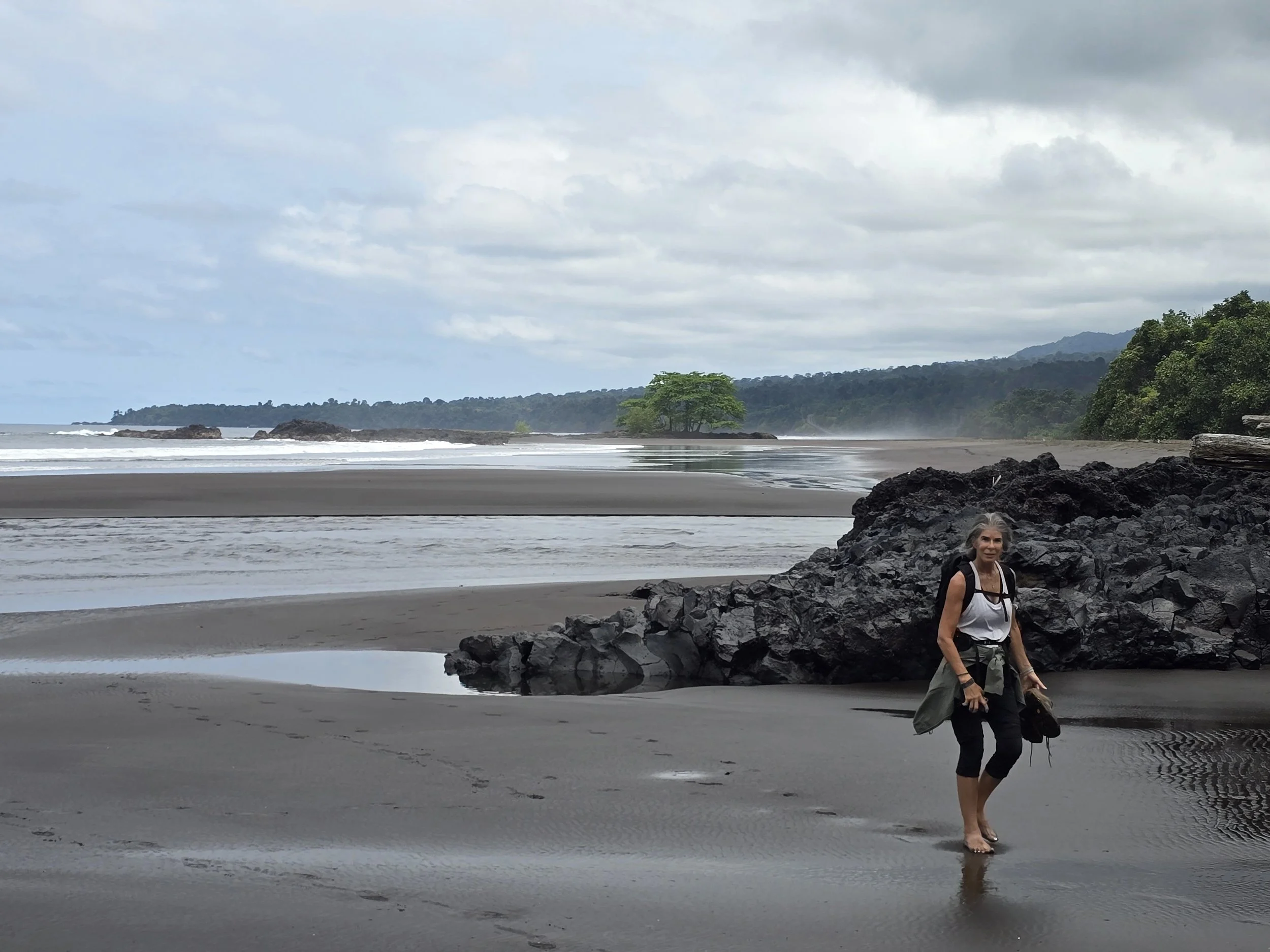 Walk along black sand beach, southern Bioko Island.jpg