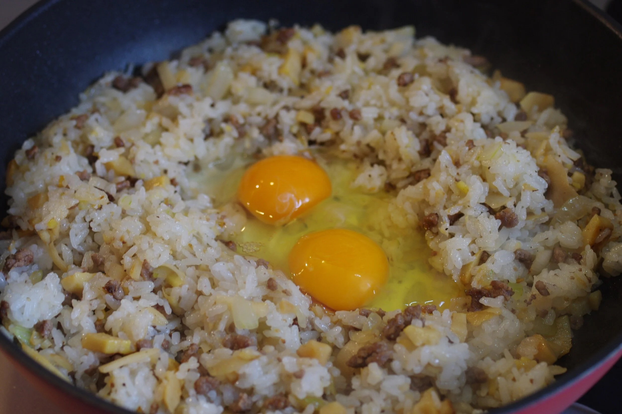 Make a hole in the center, and add 2 eggs and scramble in the middle