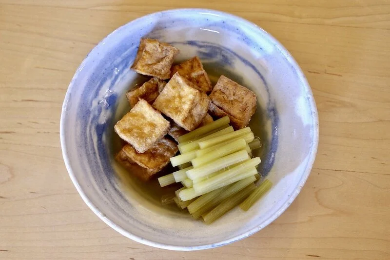 Fresh harvested fuki and fried tofu