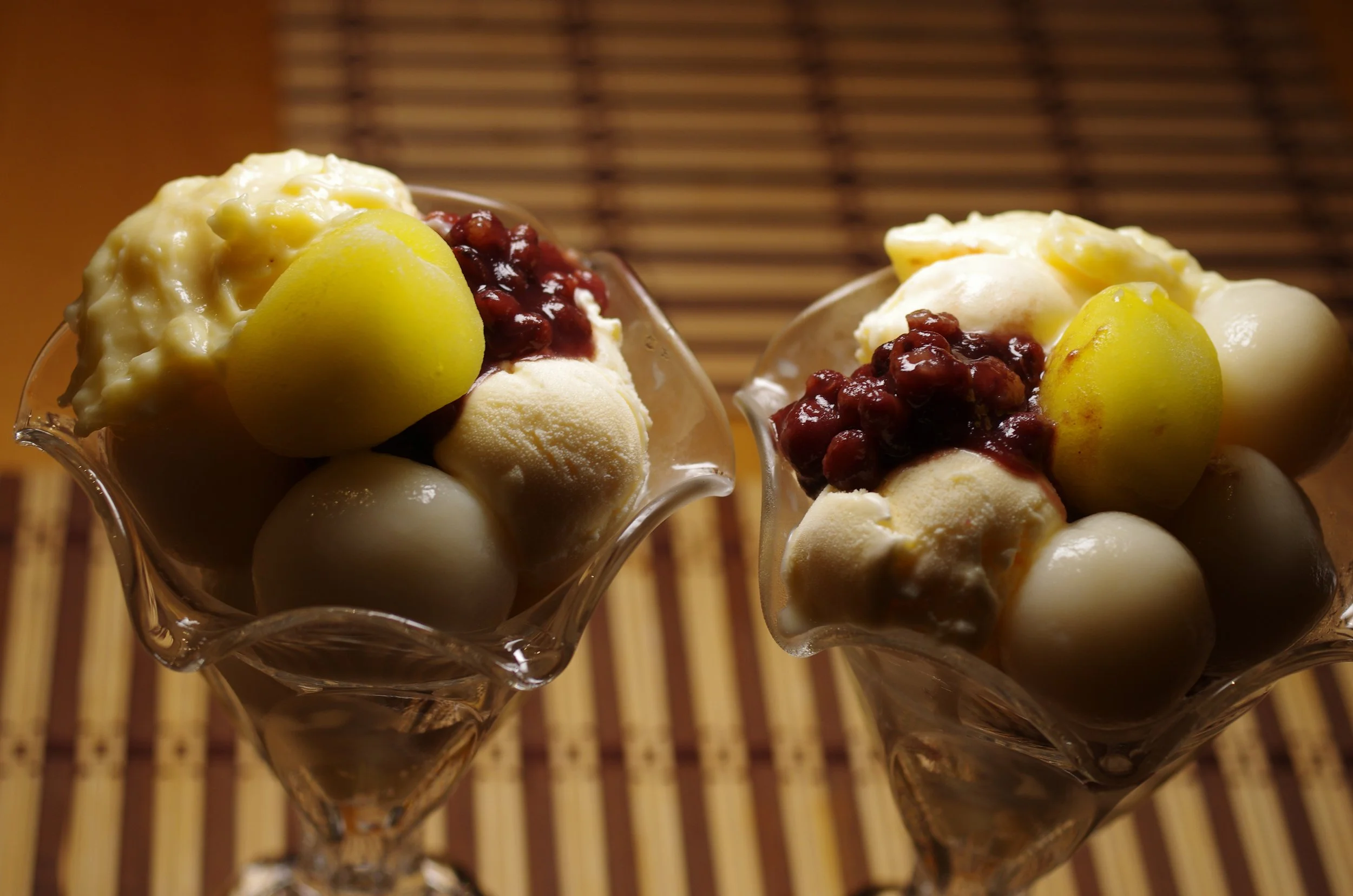 Homemade moon parfaits with custard, shiratama mochi, sweet red beans and vanilla ice cream.