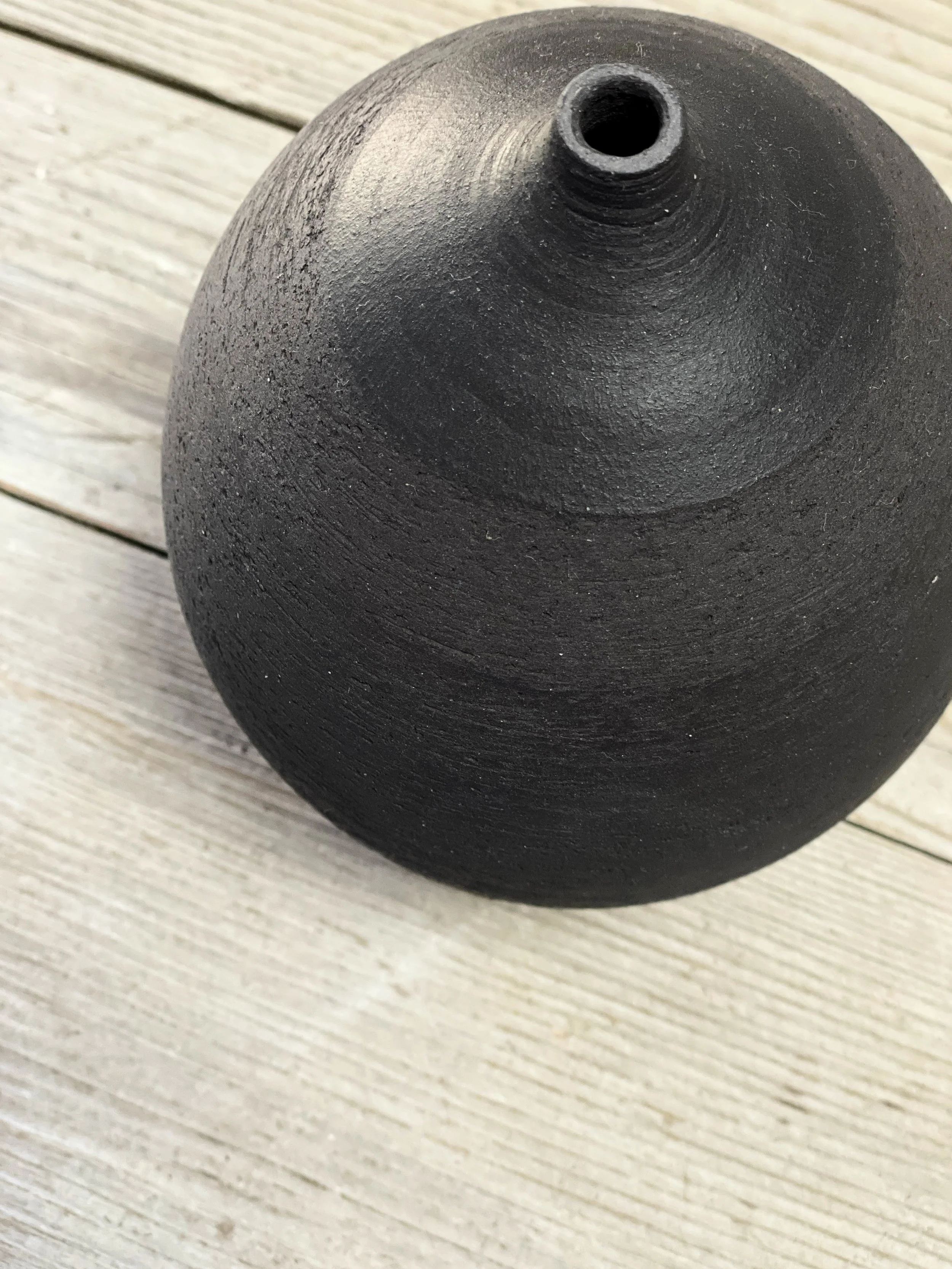 Textured black bottle 3.JPG