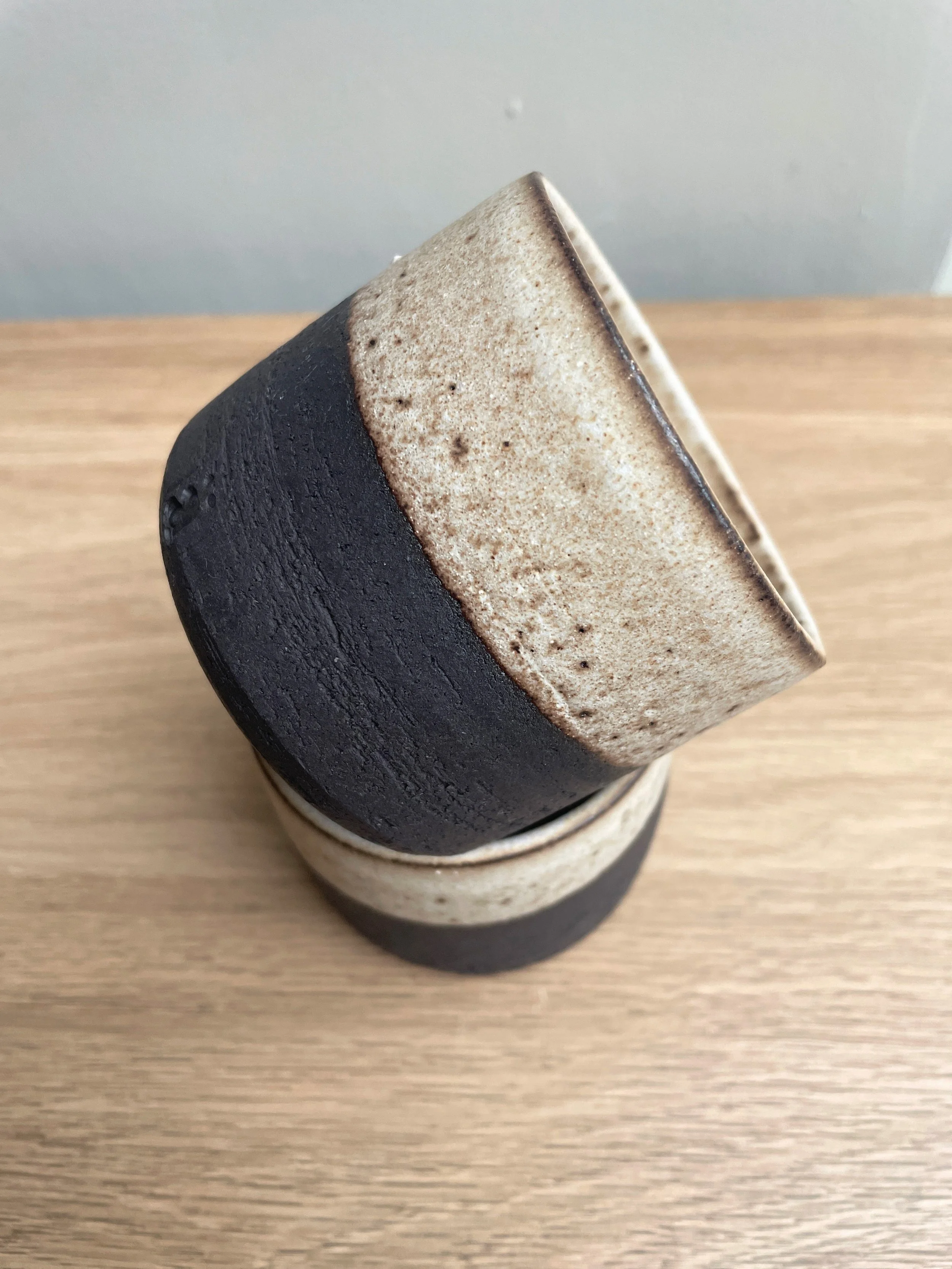 black beaker with new white top.JPG