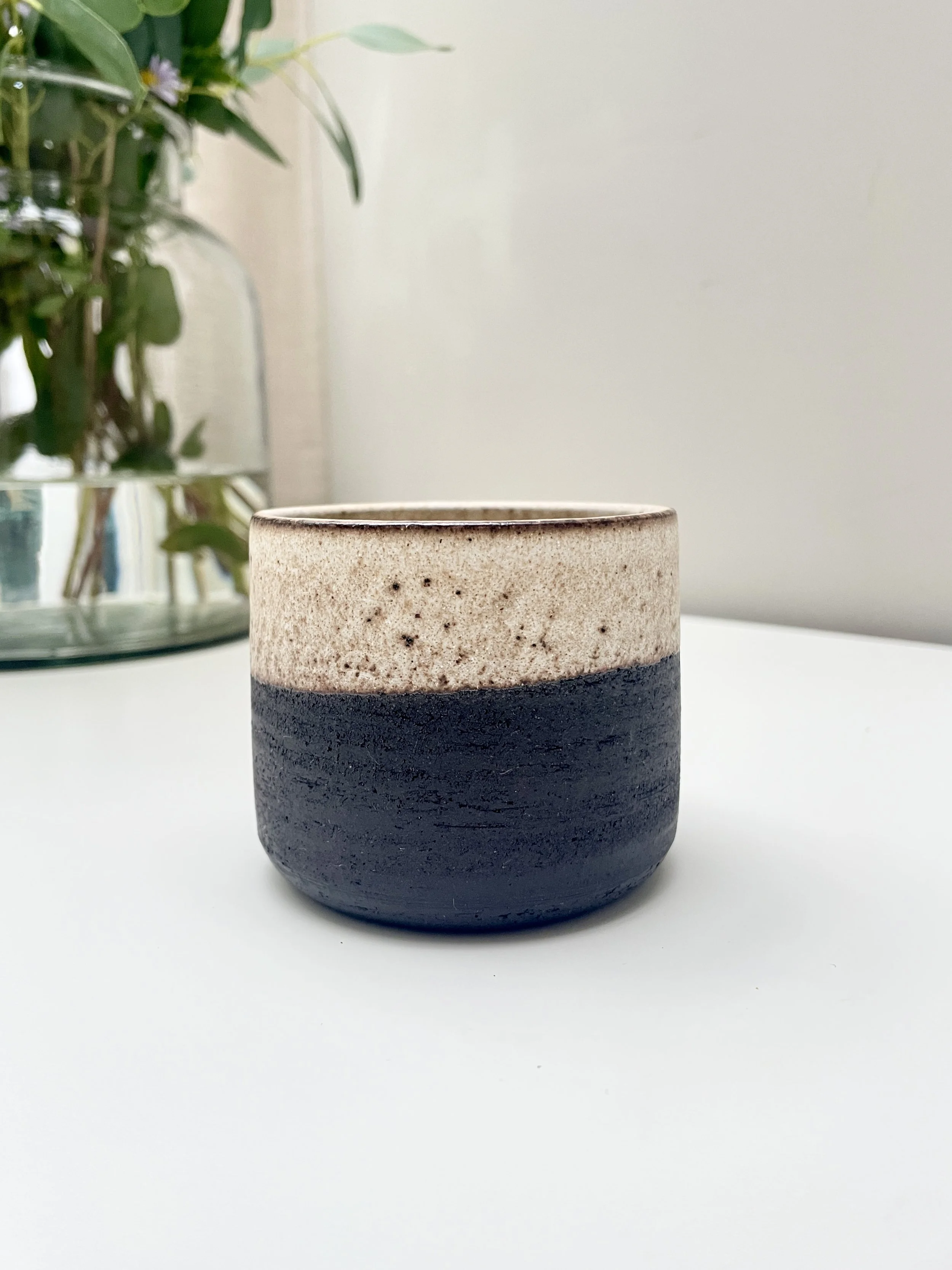 Black beaker with new white top.JPG