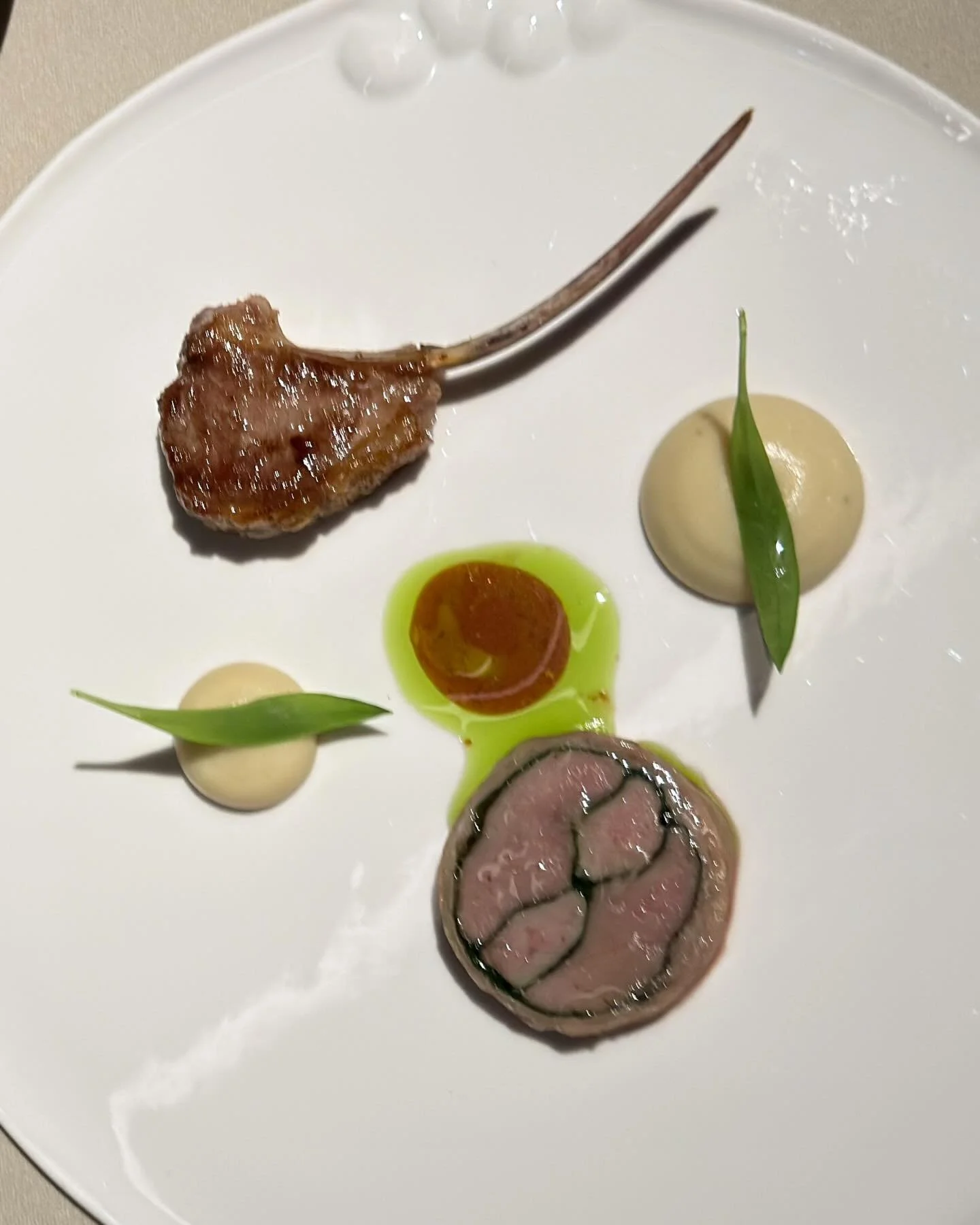 Milk-fed lamb (roasted saddle and rack, shoulder confit in a Dauphinoise). At France&lsquo;s newest three-Michelin-starred restaurant "Les Moraini&egrave;res". 
&mdash; 
#mystorywithmichelin #threemichelinstars #lesmorainieres @restaurantle