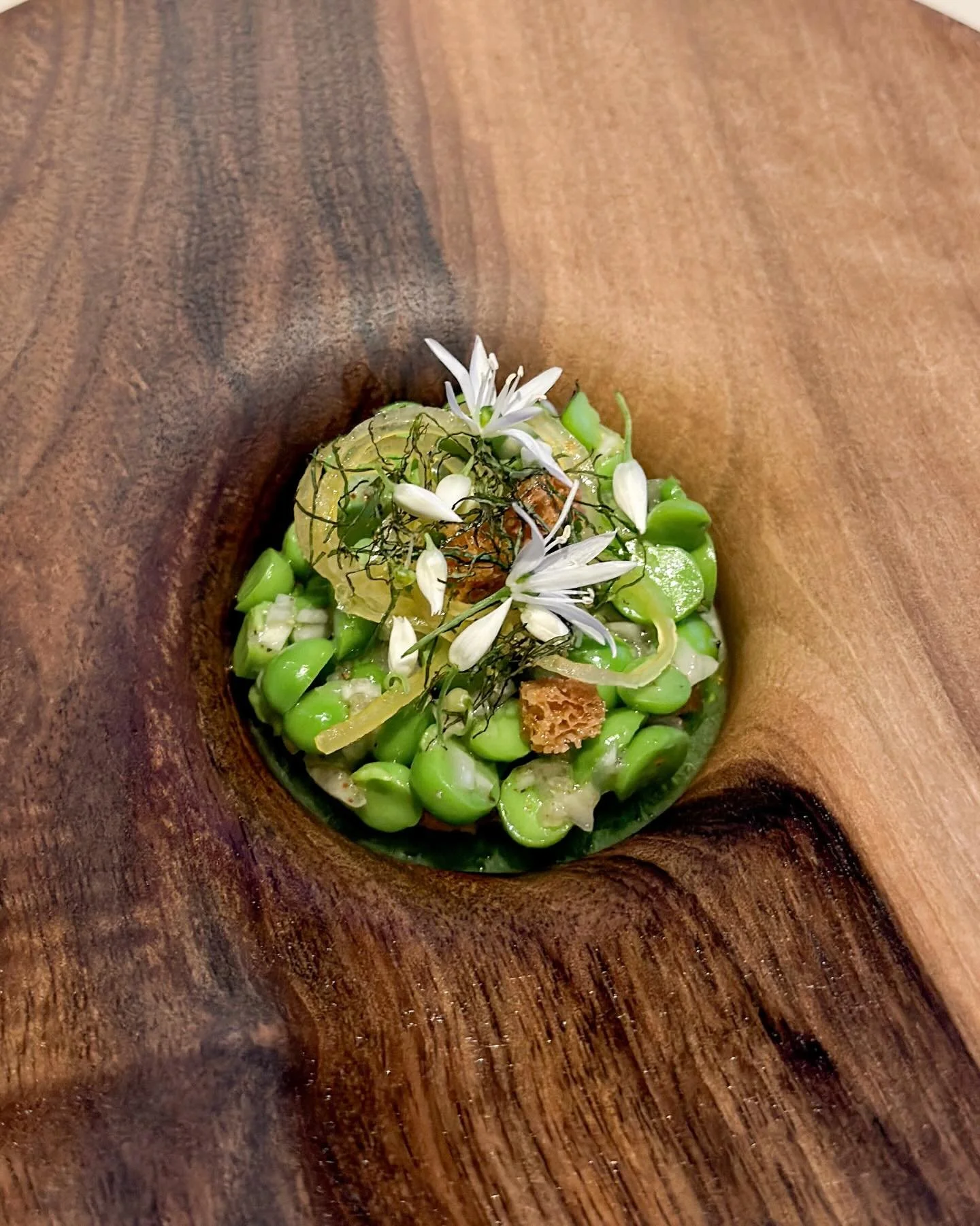 First peas, oscietra caviar, lemon balm. At France&lsquo;s newest three-Michelin-starred restaurant "Les Moraini&egrave;res". 
&mdash; 
#mystorywithmichelin #threemichelinstars #lesmorainieres @restaurantlesmorainieres