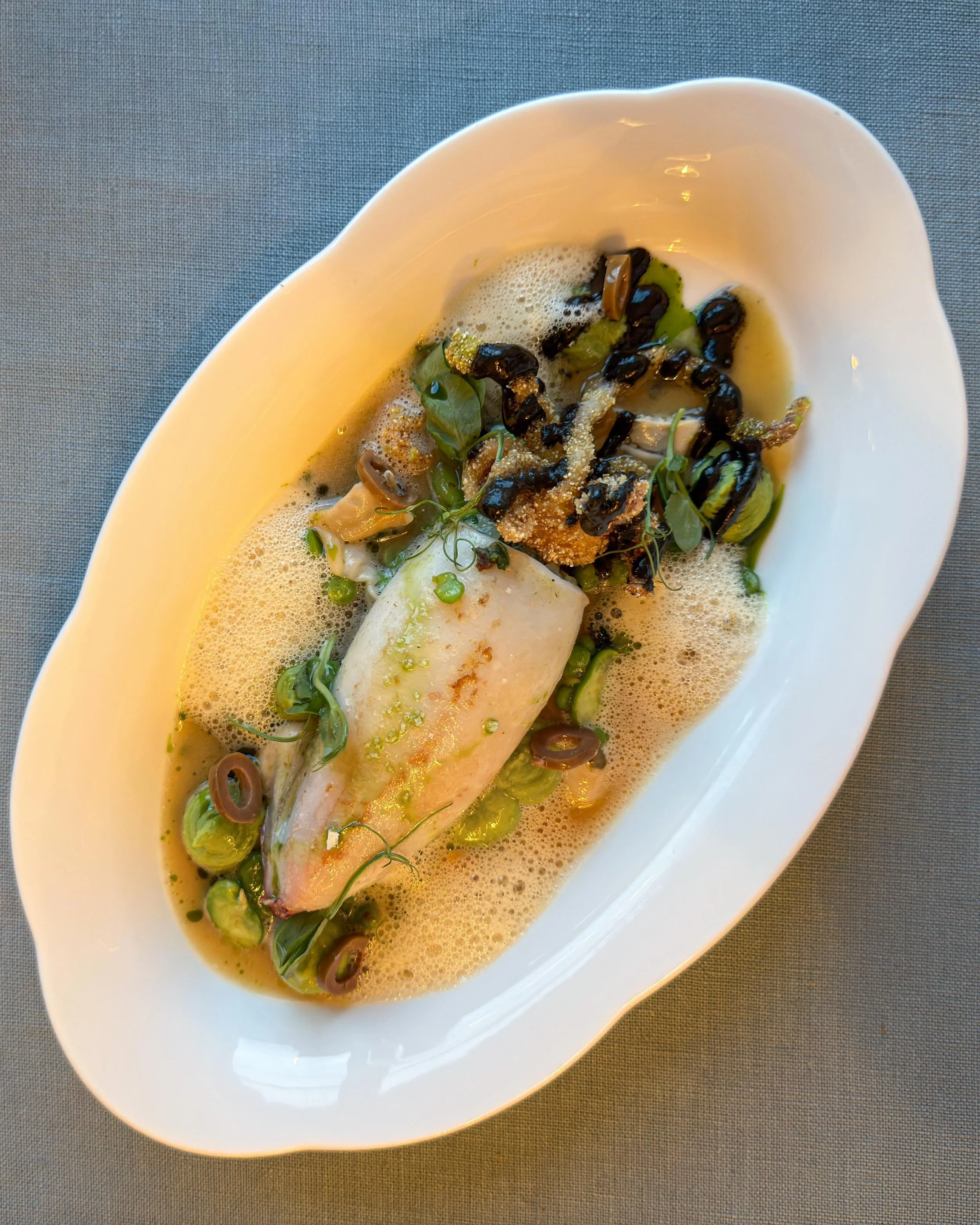Stuffed squid, Taggiasca olives. 

At restaurant "Le Grand Large" at newly opened on l'&Icirc;le de Bendor in Bendol, France. 
&mdash; 
#provence #bendol