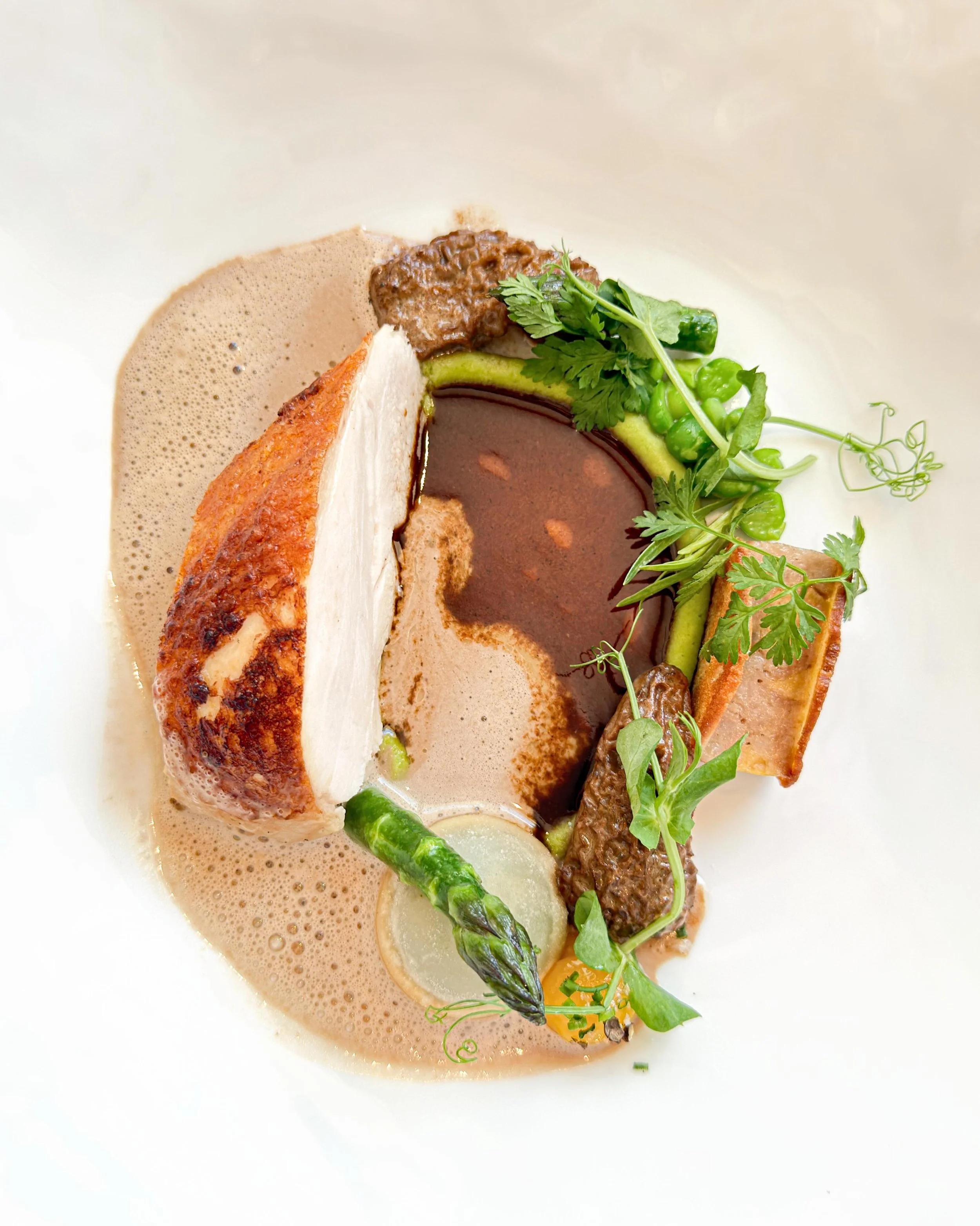 Volailles des Alpilles, morels, asparagus.

Perfectly juicy and flavorful chicken in a deeply savory morel sauce &mdash; classic luxury executed with great precision.

At three-Michelin-starred La Villa Madie in Cassis, France. 
&mdash; 
#threemichel