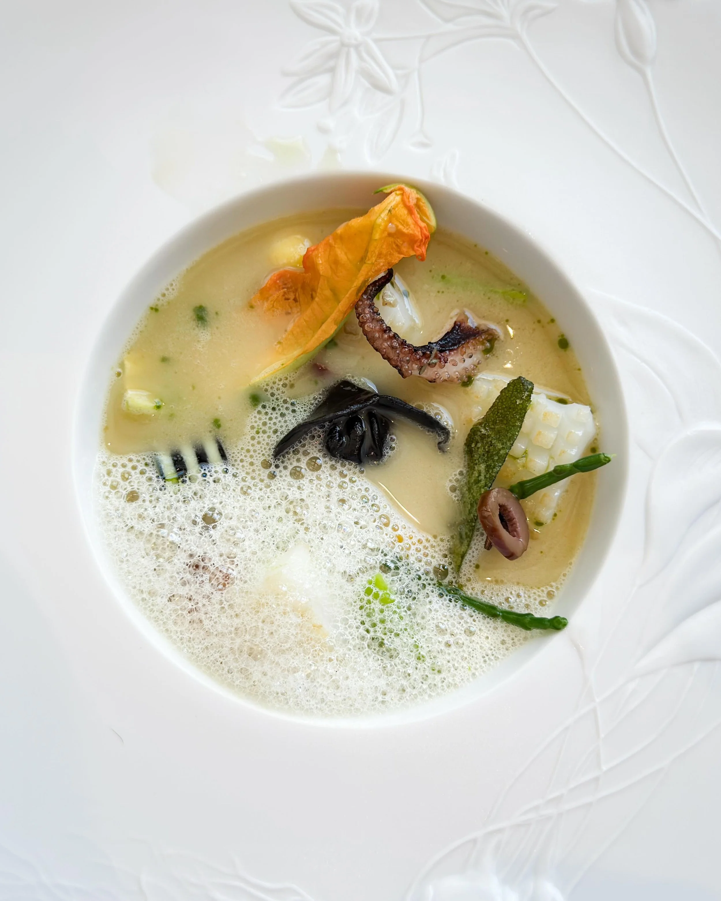 Squid, zucchini, garlic soup.

A traditional idea, sharpened and refined &mdash; with garlic playing an unusually assertive, but beautifully balanced role.

At three-Michelin-starred La Villa Madie in Cassis, France. 
&mdash; 
#threemichelinstars #tr