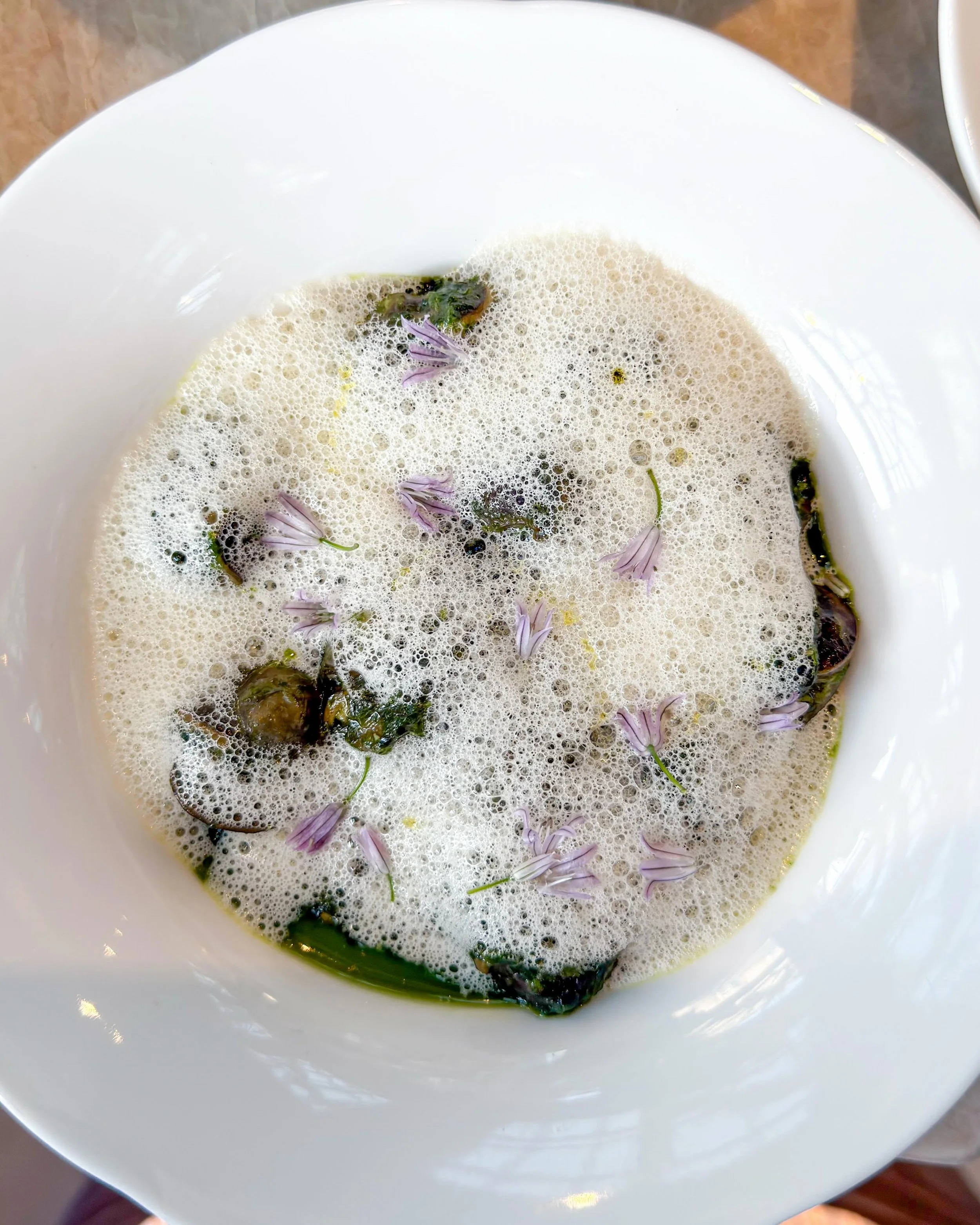 Snails, garlic, flowers. At @pinot.bistro in Hamburg. 
&mdash;
#troisetoiles_hamburg