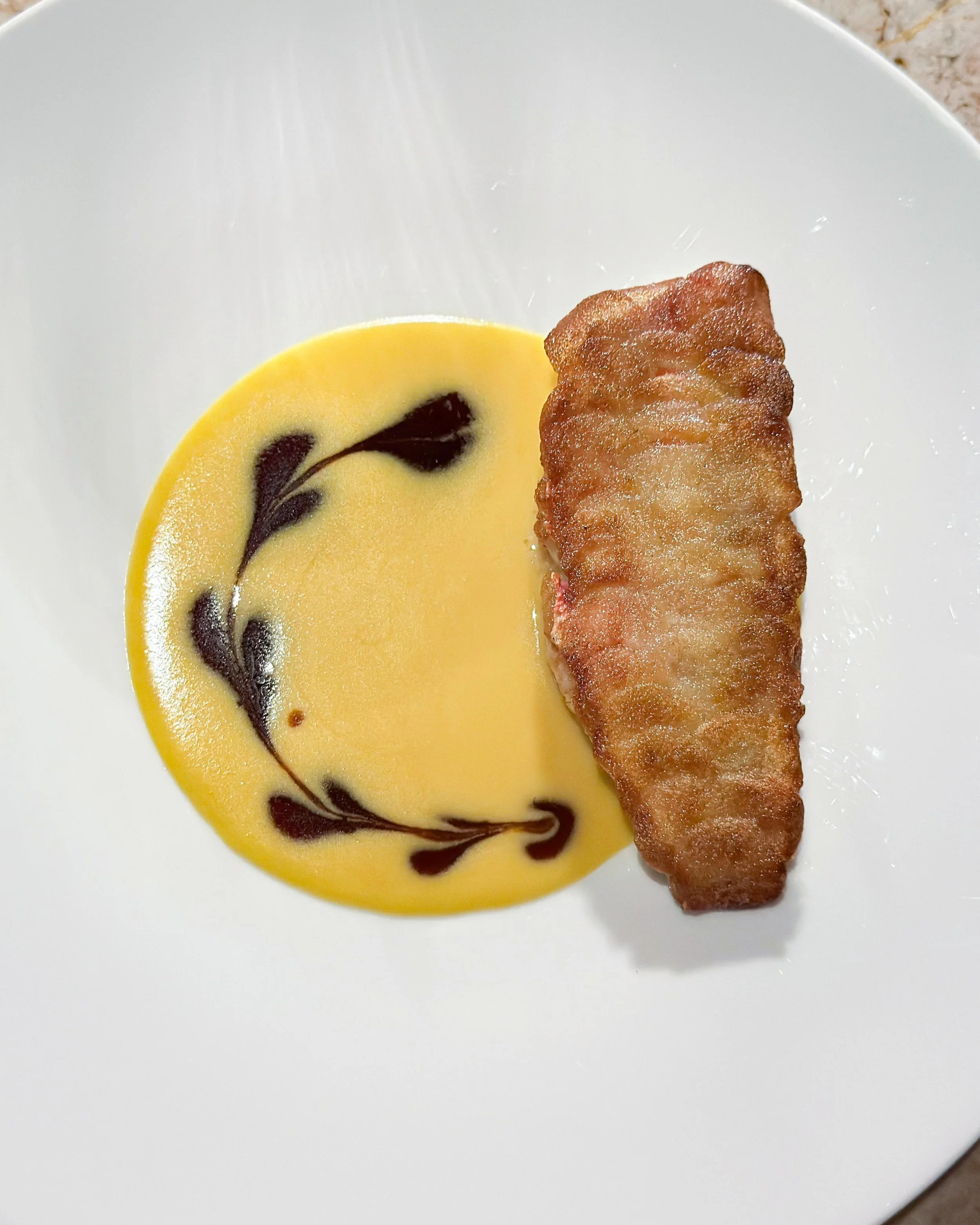 Red mullet, potato scales, orange-rosemary sauce, veal jus. From the Paul Bocuse special menu at Michelin-starred Tantris DNA in Munich. 
&mdash; 
#onemichelinstar #troisetoiles_muc #paulbocuse