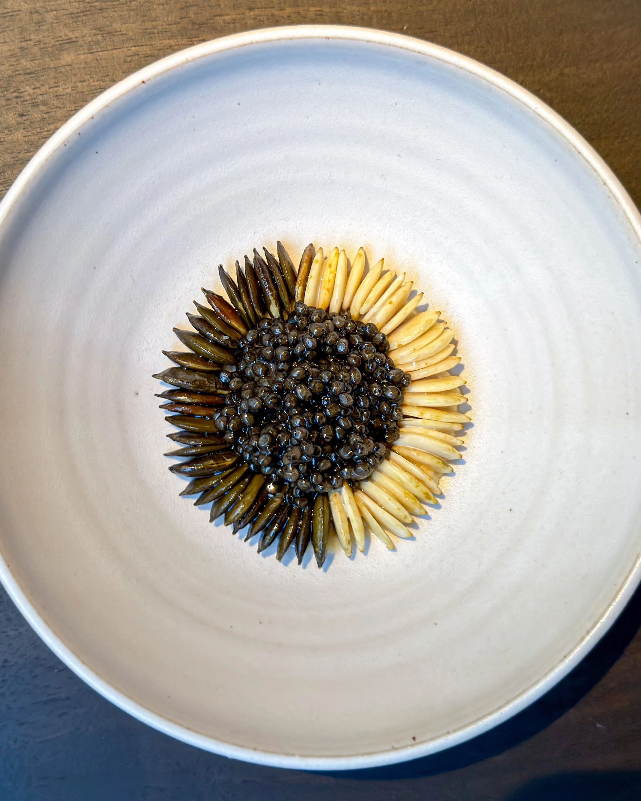 Raw shrimp, pumpkin seeds, caviar, roses.

A compelling interplay of bitterness, tender crunch and maritime intensity &mdash; outstanding, though the choice of caviar and a few details of balance kept it just short of complete harmony.

At now three-