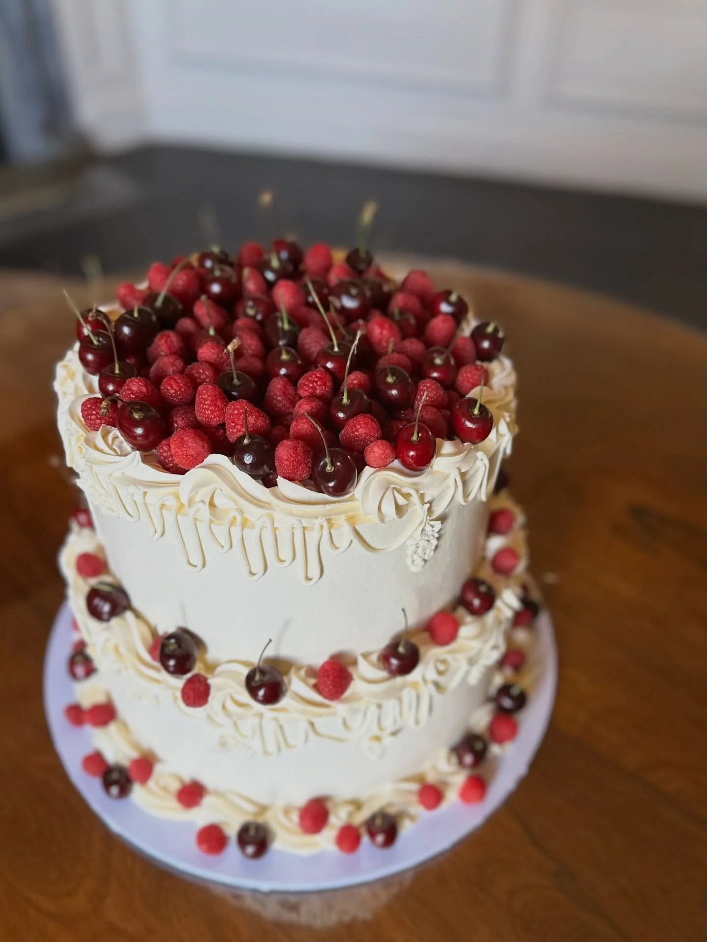 Cherries, raspberries &amp; draped piping for the lovely S &amp; M @brymptonhouse ❤️

I also created a mini dessert table of brownies and cupcakes, plus an extra box of cupcakes filled with wasabi for the groom to prank some of his groomsmen&hellip; 