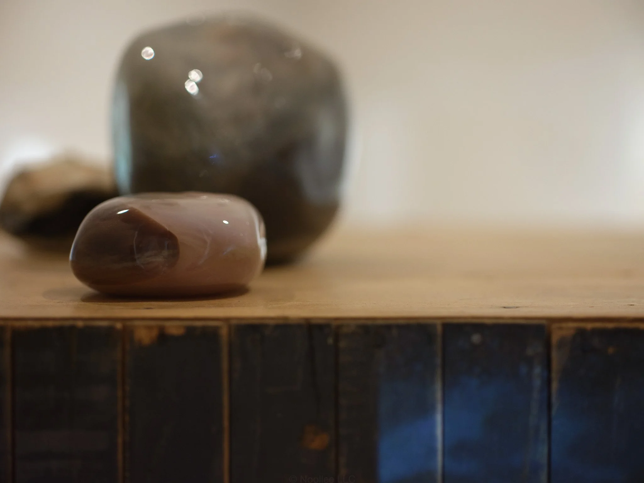 Installation detail of glass objects from The Day Lasts More Than a Thousand Sunsets by Artist Rae Stern. Photo by T Maxwell Wagner