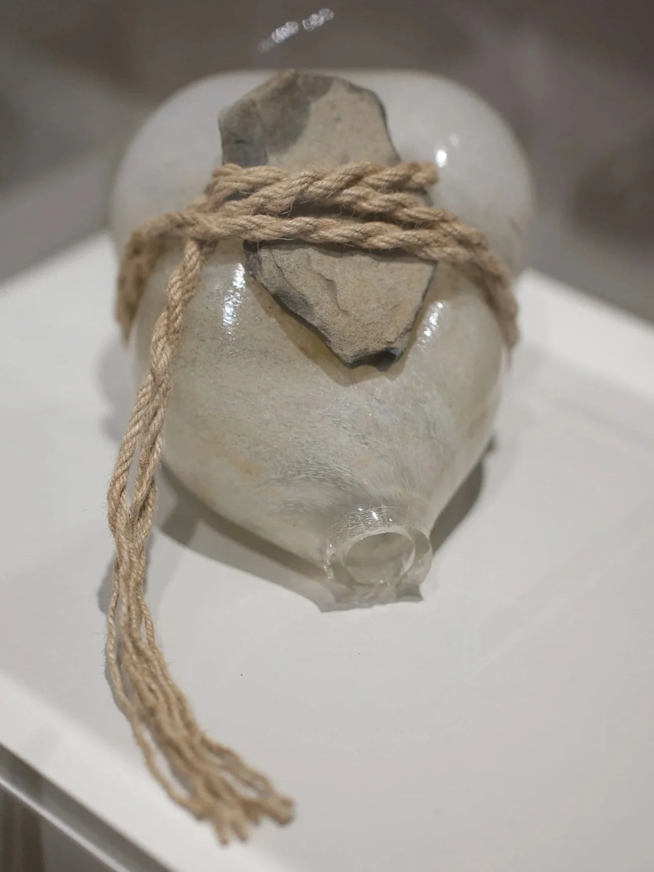 Artwork by artist Rae Stern made of glass, rope and stone