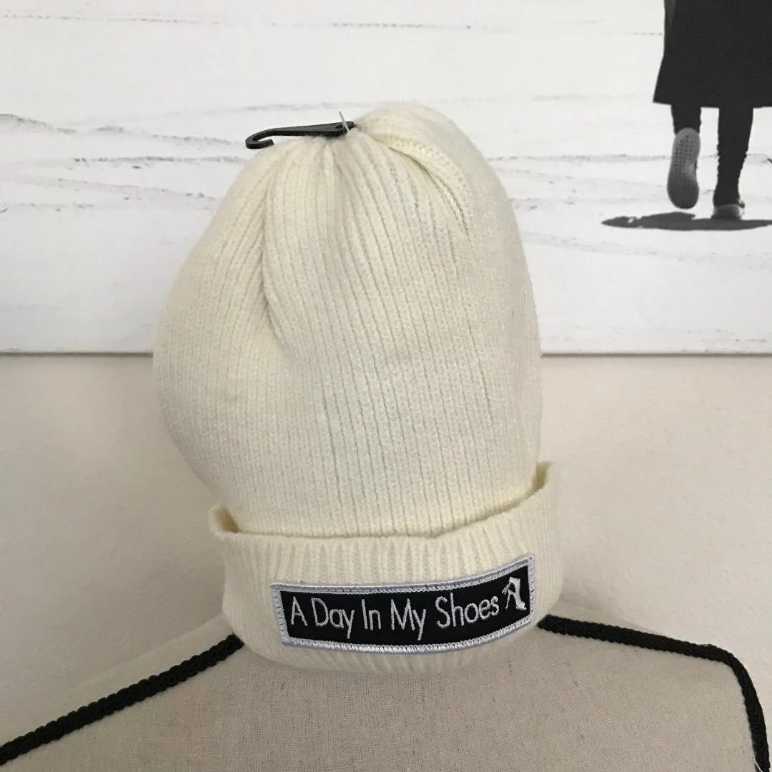 cream ribbed nice patched hat.jpg