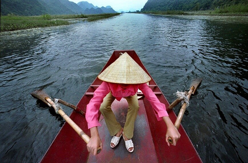 vietnam:girl rows no face.jpg