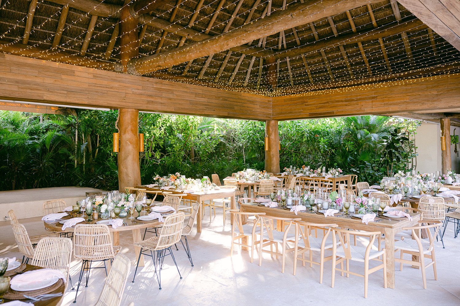 32 nice wedding reception decoration tables with lights on the palm ceiling at Rosewood Mayakoba Riviera Maya Cancun.JPG