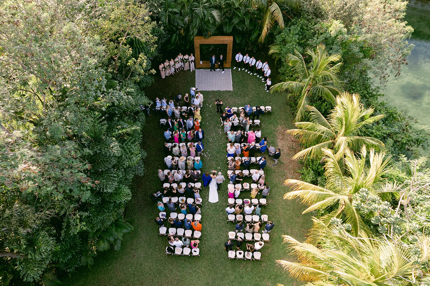 25 incredible wide drone photography upper view of the wedding ceremony set with bride entering at Rosewood Mayakoba Riviera Maya Cancun Mexico.JPG