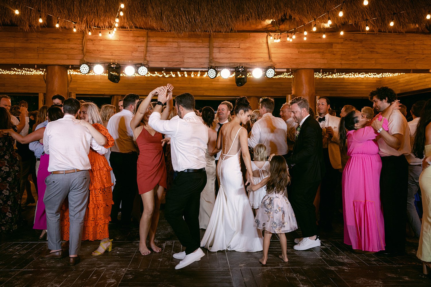 51 all guests joining to dance and celebrate at the wedding night party at Rosewood Mayakoba Riviera Maya Cancun.jpg