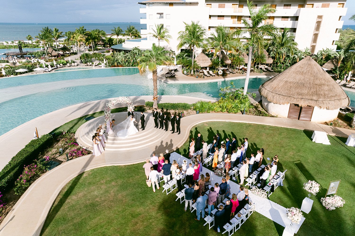 34 amazing drone shot of wedding ceremony over green grass with sea view at Dreams Riviera Cancun Mexico.JPG