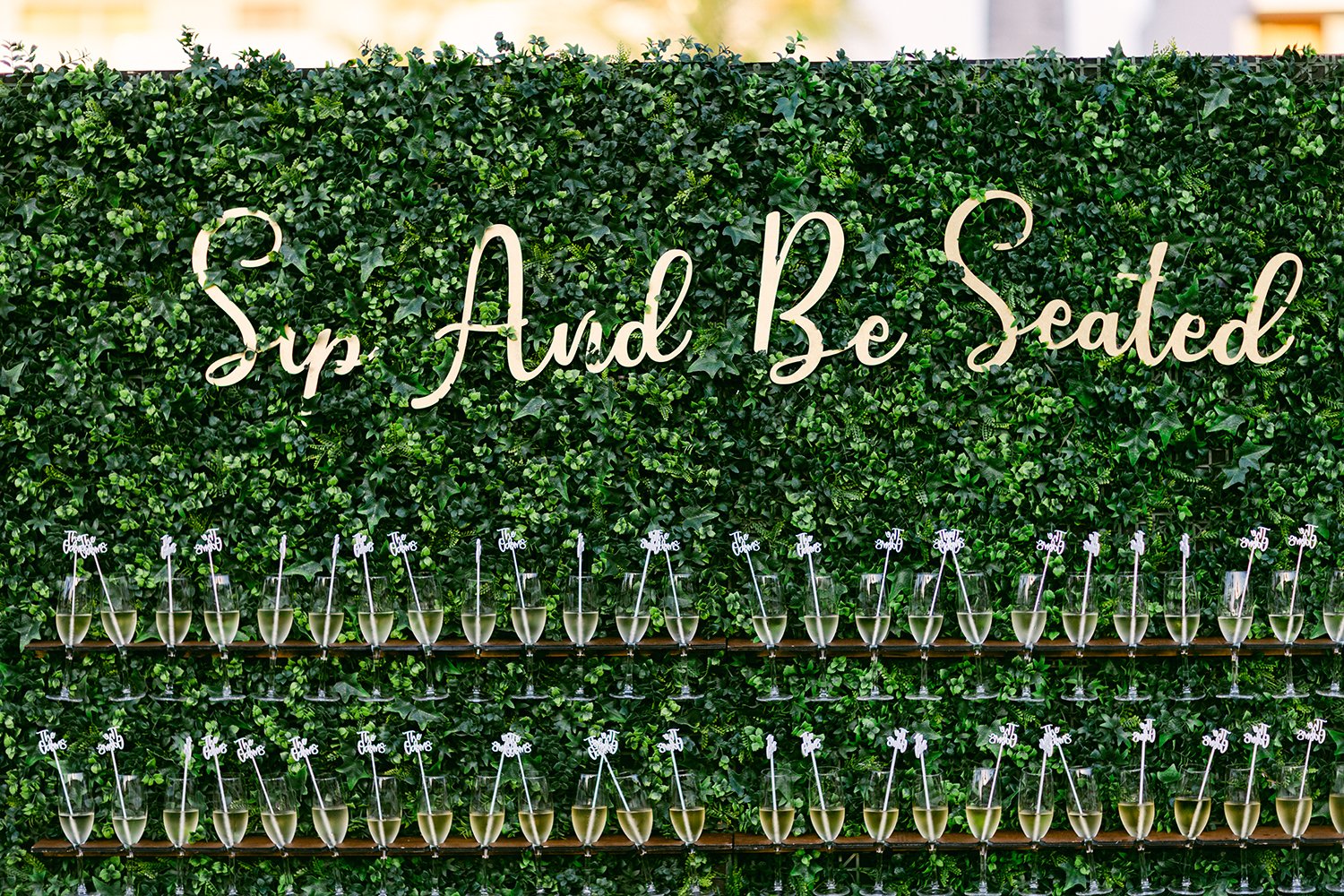 48 wedding decoration green wall full of wine glasses at Dreams Riviera Cancun.JPG