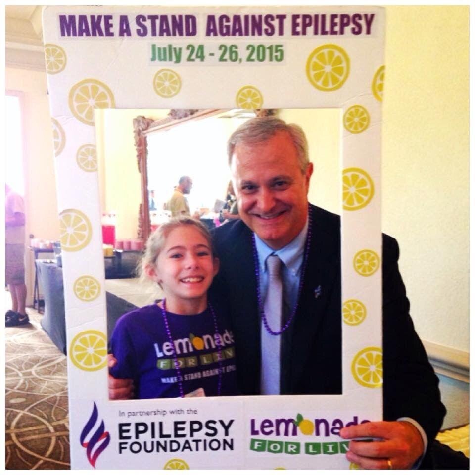  Phil celebrates with CEO of the Epilepsy Foundation Kids Crew, Hailey Scheinman, who founded Livy’s Hope and Lemonade for Livy, in honor of her twin sister, Livy, who courageously fights epilepsy every day, with the support of Hailey and her parents