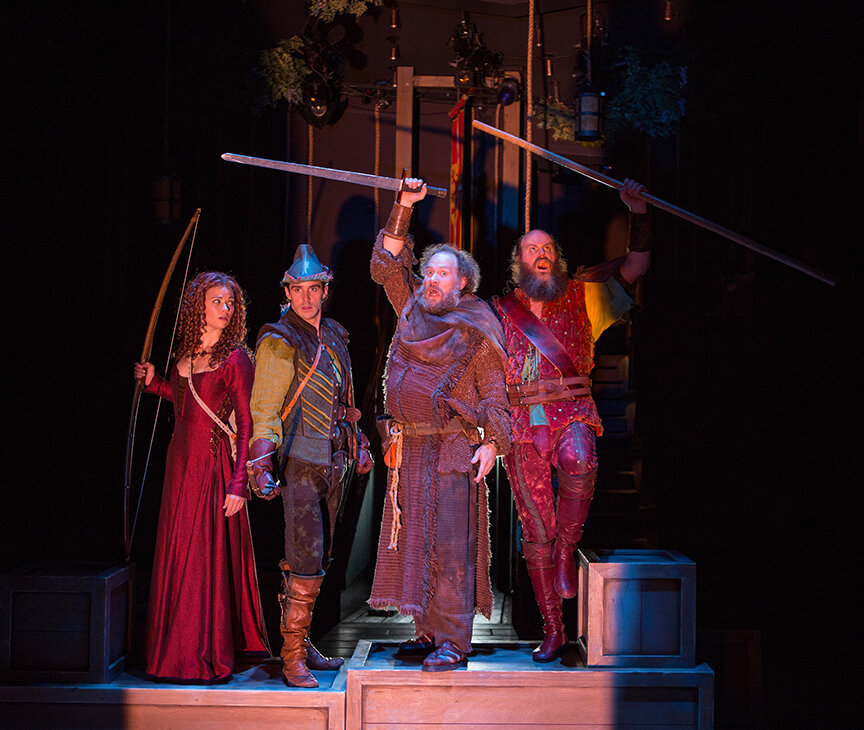  (from left) Meredith Garretson as Maid Marian, Daniel Reece as Robin Hood, Andy Grotelueschen as Friar Tuck, and Paul Whitty as Little John. Photo by Jim Cox. 