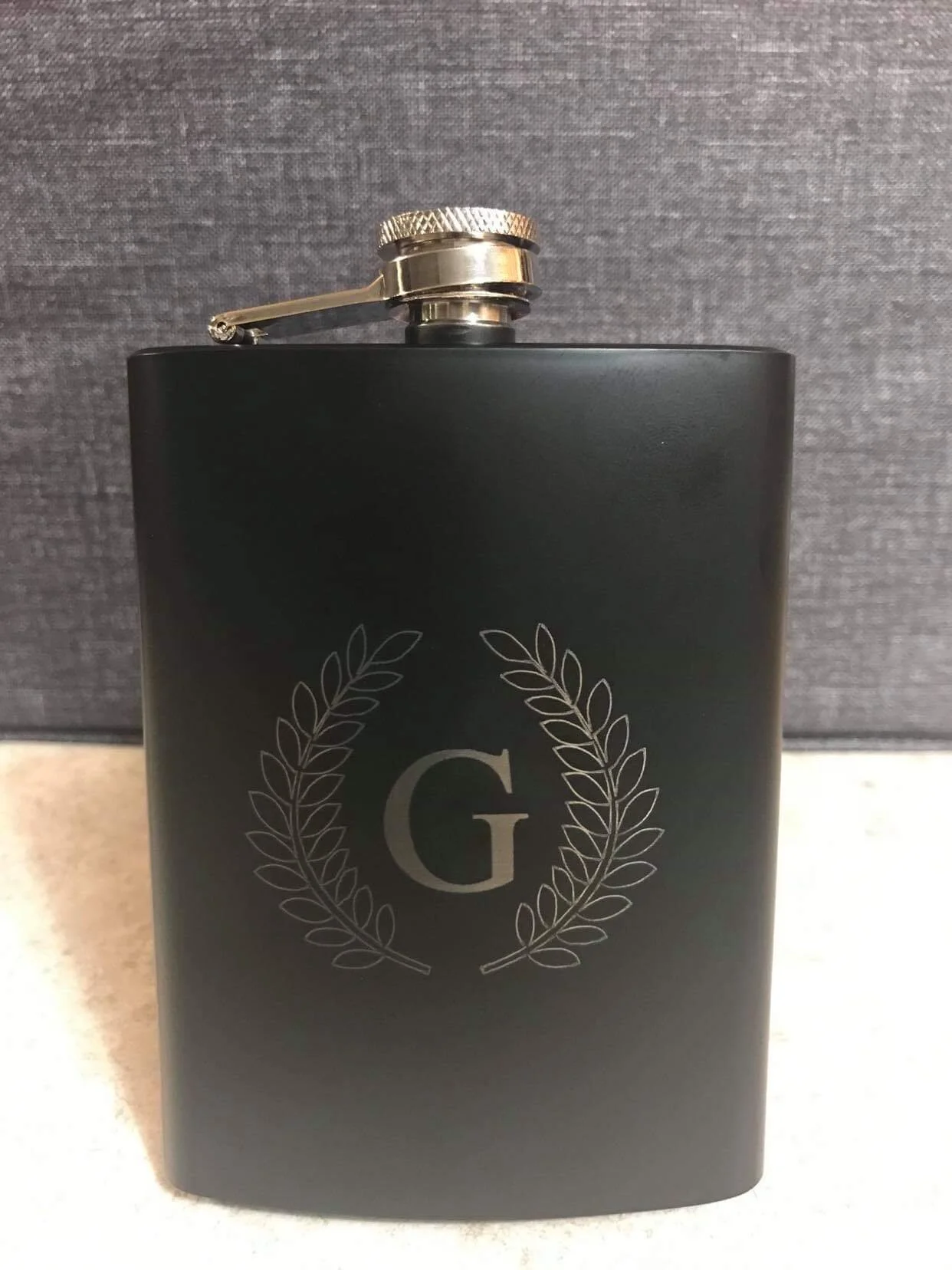 flask, engraved. stainless steel