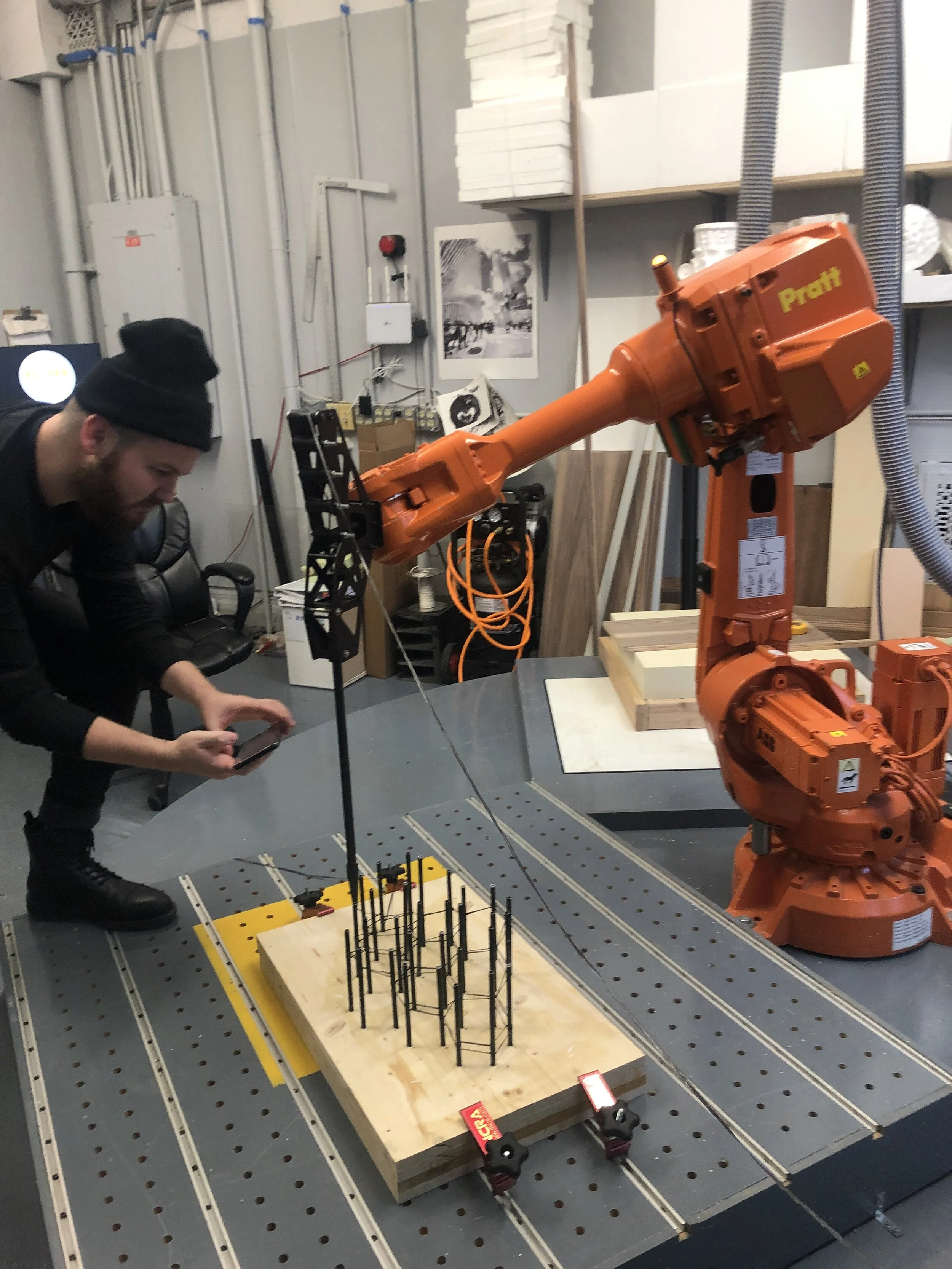  Greg Sheward at Pi-Fab at Pratt Institute photographing a student prototype 