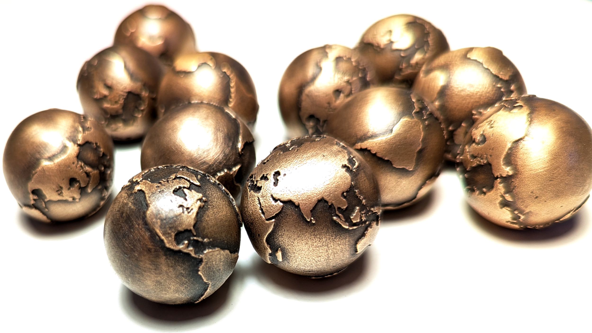 20230926_Bronze Globes_CONCEPT REALIZATIONS_233324393b.PNG
