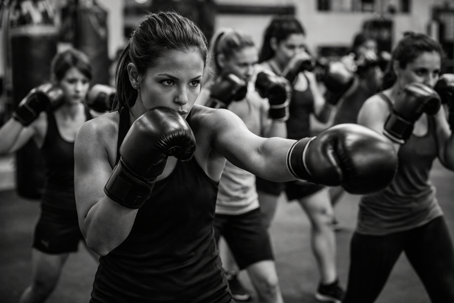 Focused determination in boxing class.png