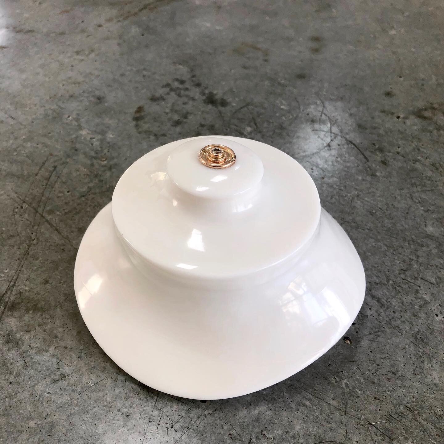  Once the soap is finally depleted, a 14K rose gold pin with 1/5 carat champagne diamond is discovered and worn or the engineered marble base along with the golden jewel can also be displayed as wall art. 