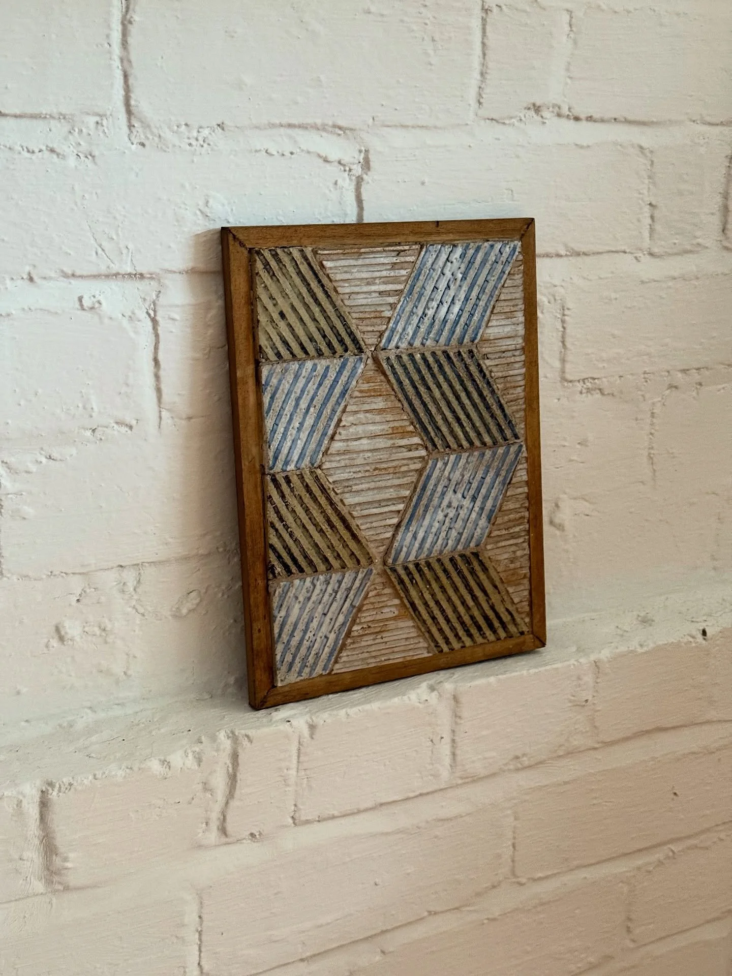 These small, hand-crafted art pieces are part of a larger collection of ceramic artworks by late British artist Romarin Grazebrook (1934 - 2024). Artist, sculptor and mosaic maker - working from her London home studio Grazebrook was known for paintin