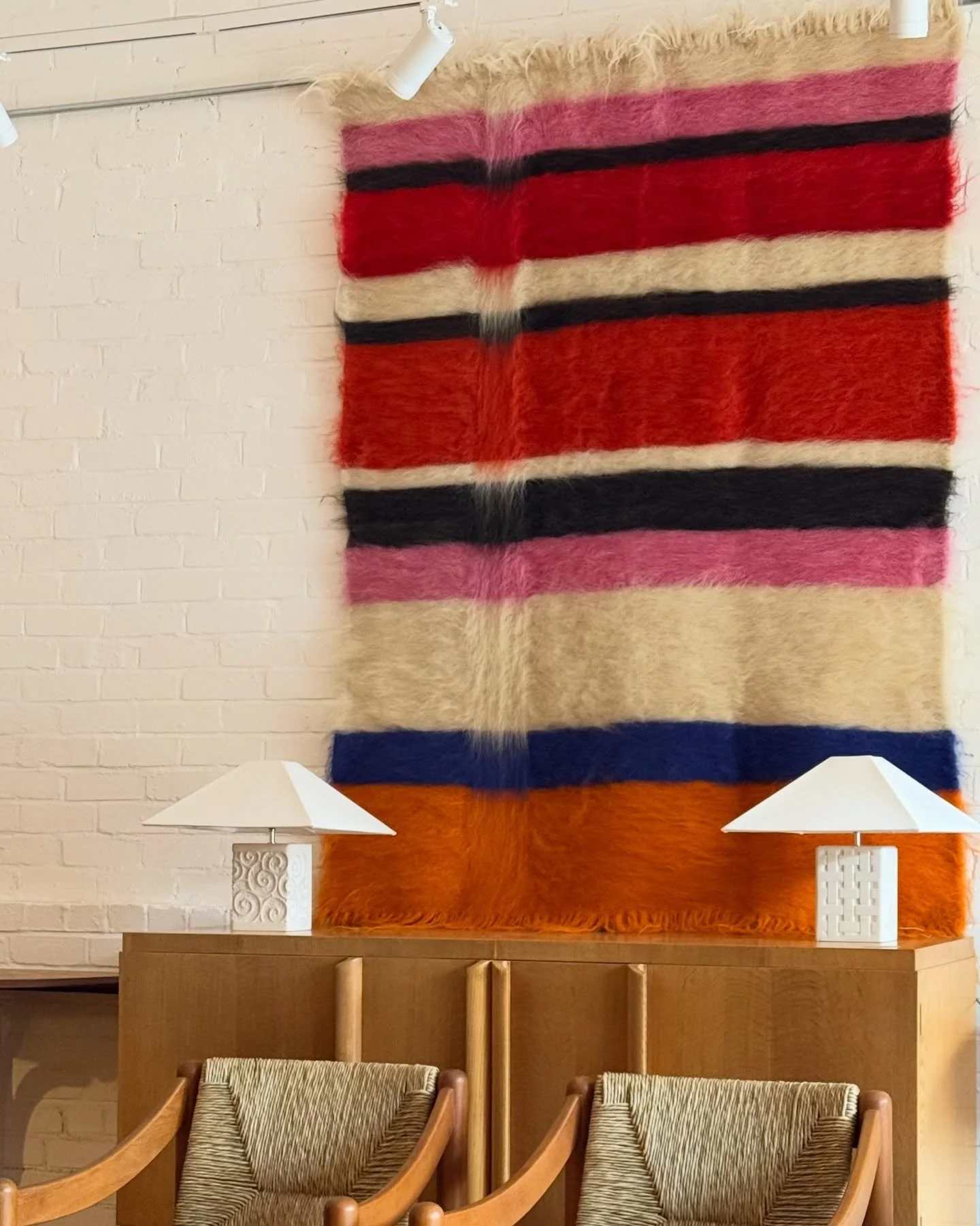 Good morning, 

I&rsquo;ve had a lot of questions about this rug so here&rsquo;s a little more detail. It&rsquo;s a new piece not vintage but a complete original &amp; bespoke design. Naturally dyed sheep wool they&rsquo;re hand woven by Hutsul artis