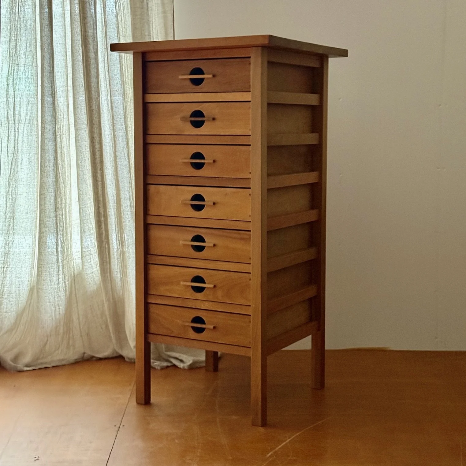 J1 Series storage unit with vintage-style drawers and matte lacquer finish.