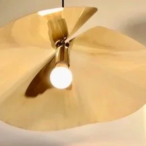 Decorative brass ceiling pendant with reflective finish, handmade floral design