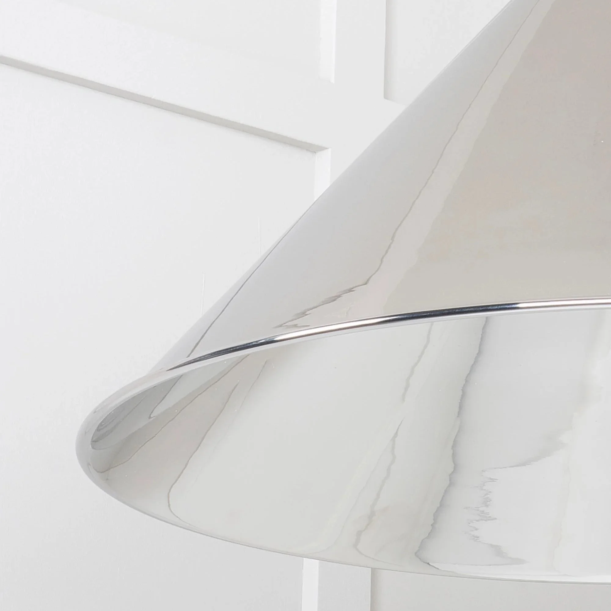 Close-up of the Hawthorne nickel pendant lamp showing sleek metallic surface and reflective finish