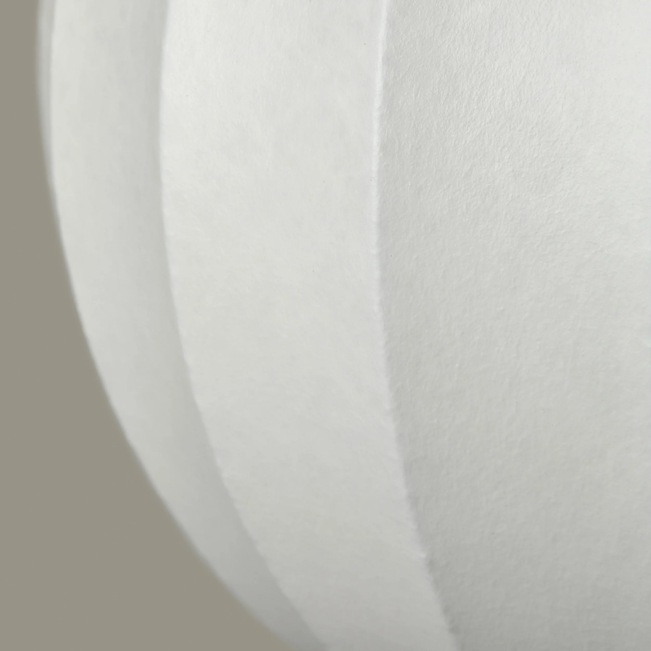 Side profile of British-made ceiling lampshade in neutral fabric-03