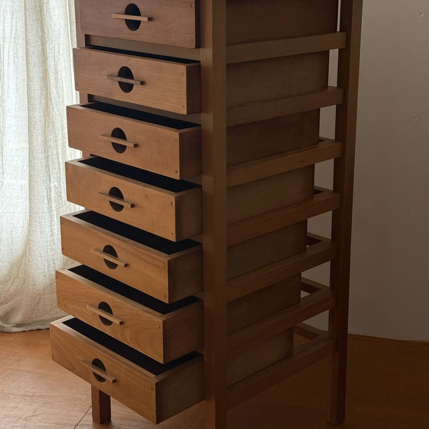 Close-up of J1 Series walnut pegged drawers and wood-on-wood slides.