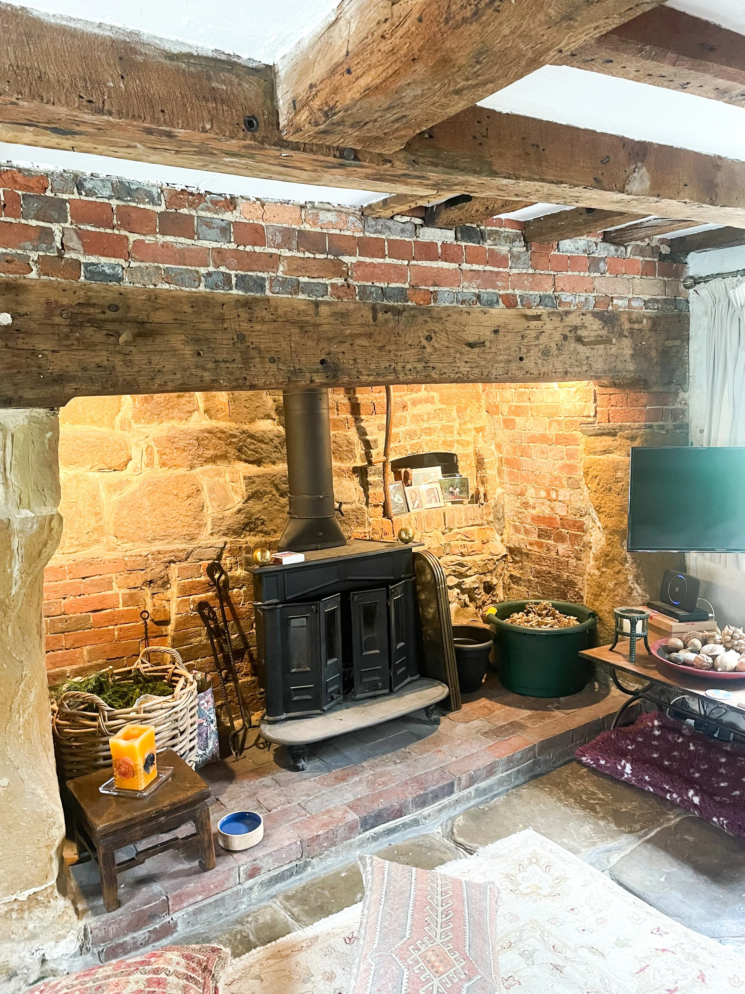 inglenook fireplace in interior design project in Warninglid