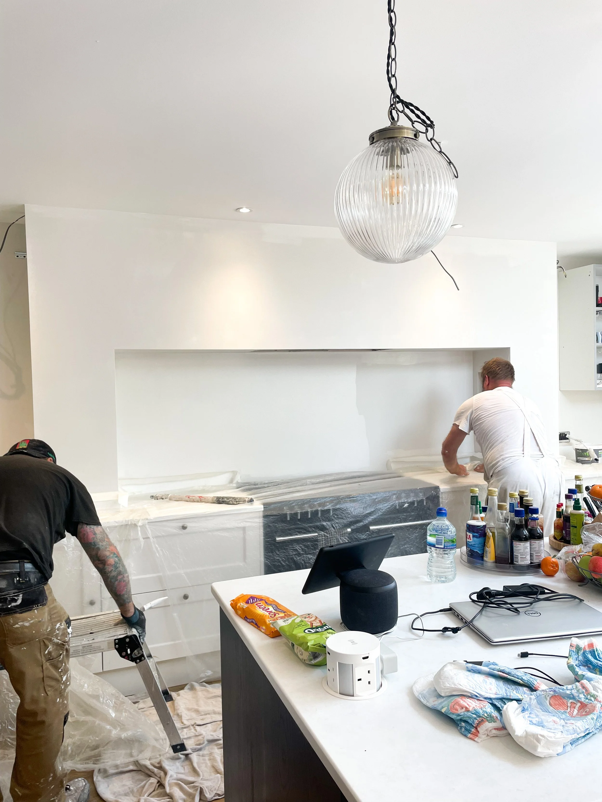 mantle being decorated in interior design project in steyning