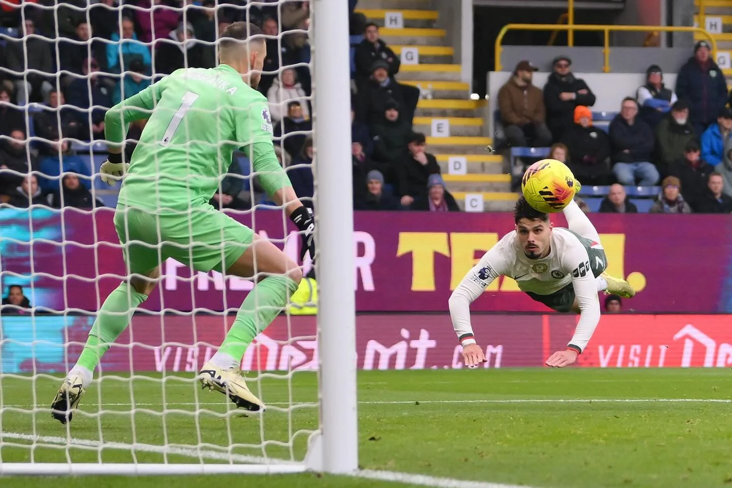 Pedro Neto leaps to head Chelsea in front during the first half at Turf Moor. Photograph: Gary Oakley/PA

@pamediaimages @alamyeditorial #epl #premierleauge #chelsea #cfc #football