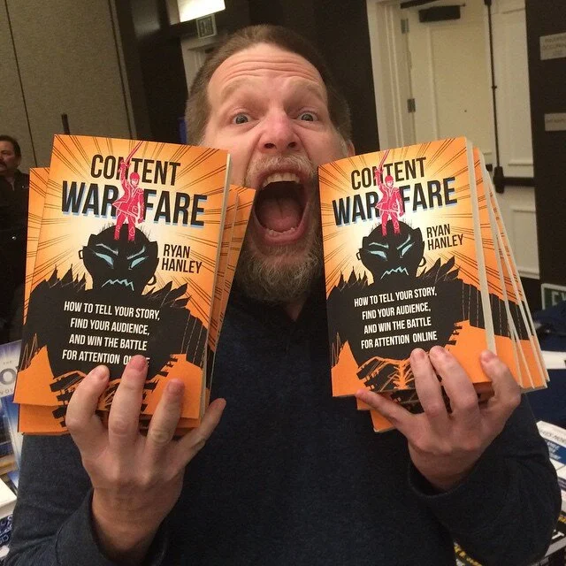 Chris-Brogan-holds-books.jpg