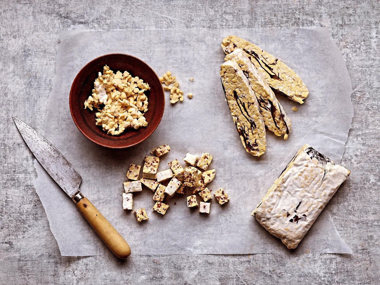 Struggling with tempeh inspo? We can't think of a dish that doesn't work with a good bit of tempeh:

- Mince it: crumble by hand (or use a food processor), fry, add seasoning, have it with tacos - or if you're feeling lazy, try out taco topper mince 