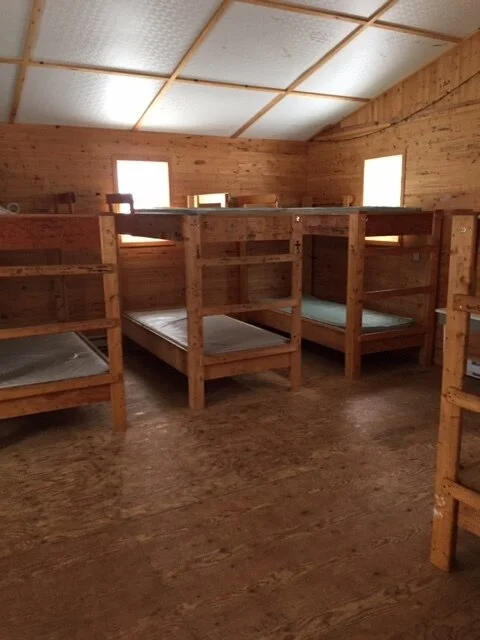 the bunks inside a sample cabin at camp pagweak